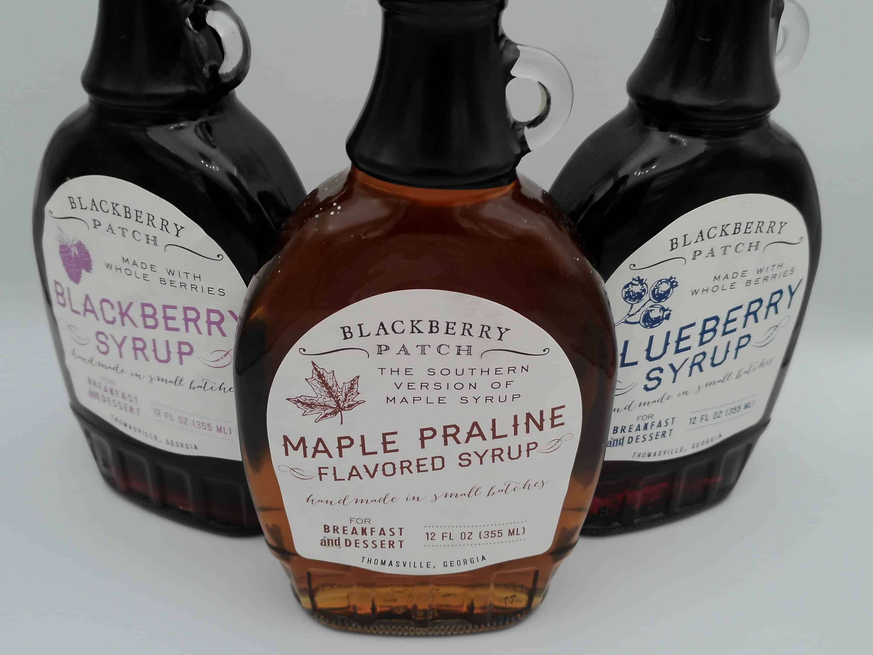 Three different flavors of Blackberry Patch's syrup next to each other