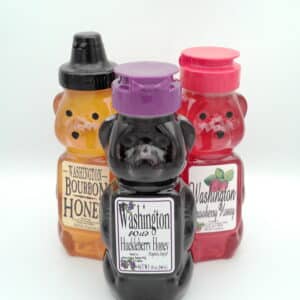 Assorted bottles of Huckleberry People Honey Bear